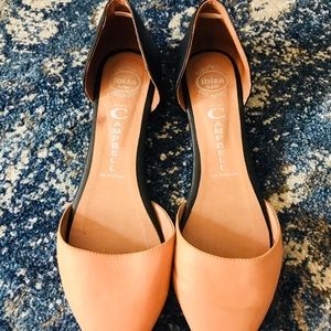 Cream and black flats